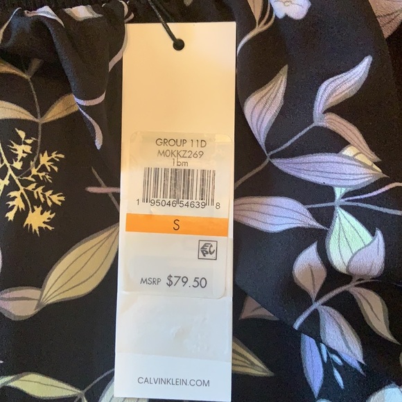 5. Add some WOW to your closet!!!!!!Calvin Klein Floral Wide Leg Pants in Black - Picture 11 of 16